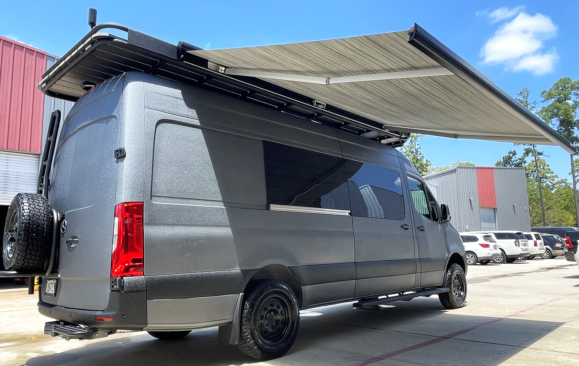 Custom Awning, Ladder, Roof Deck, and Powder Coated Exterior