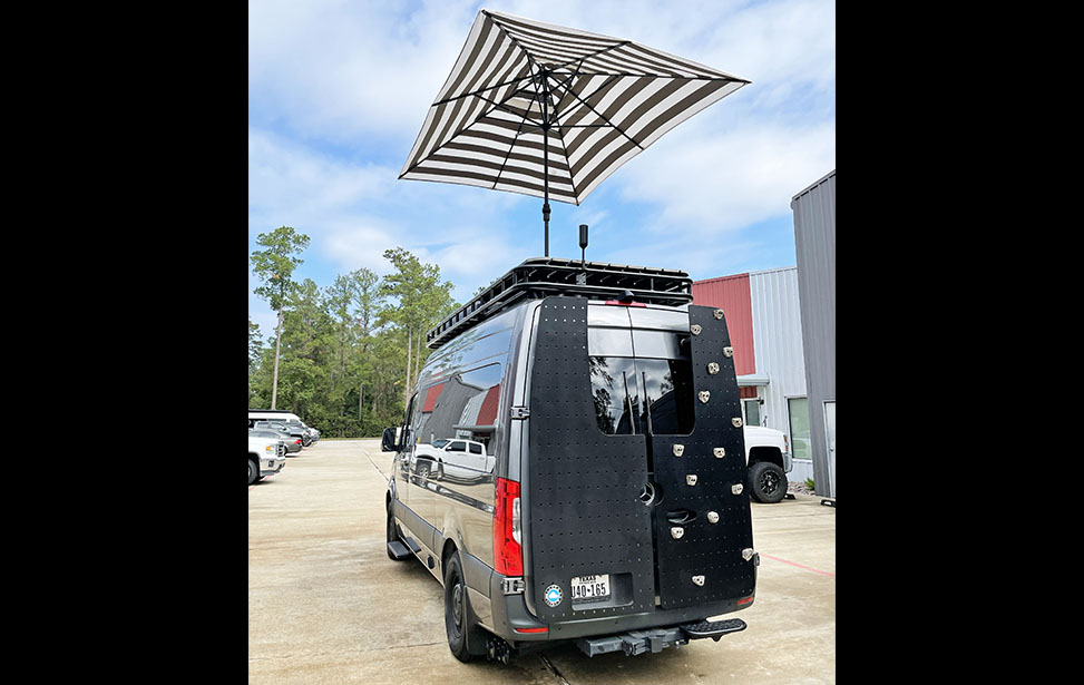 Custom Rock Wall to Roof Deck and Umbrella